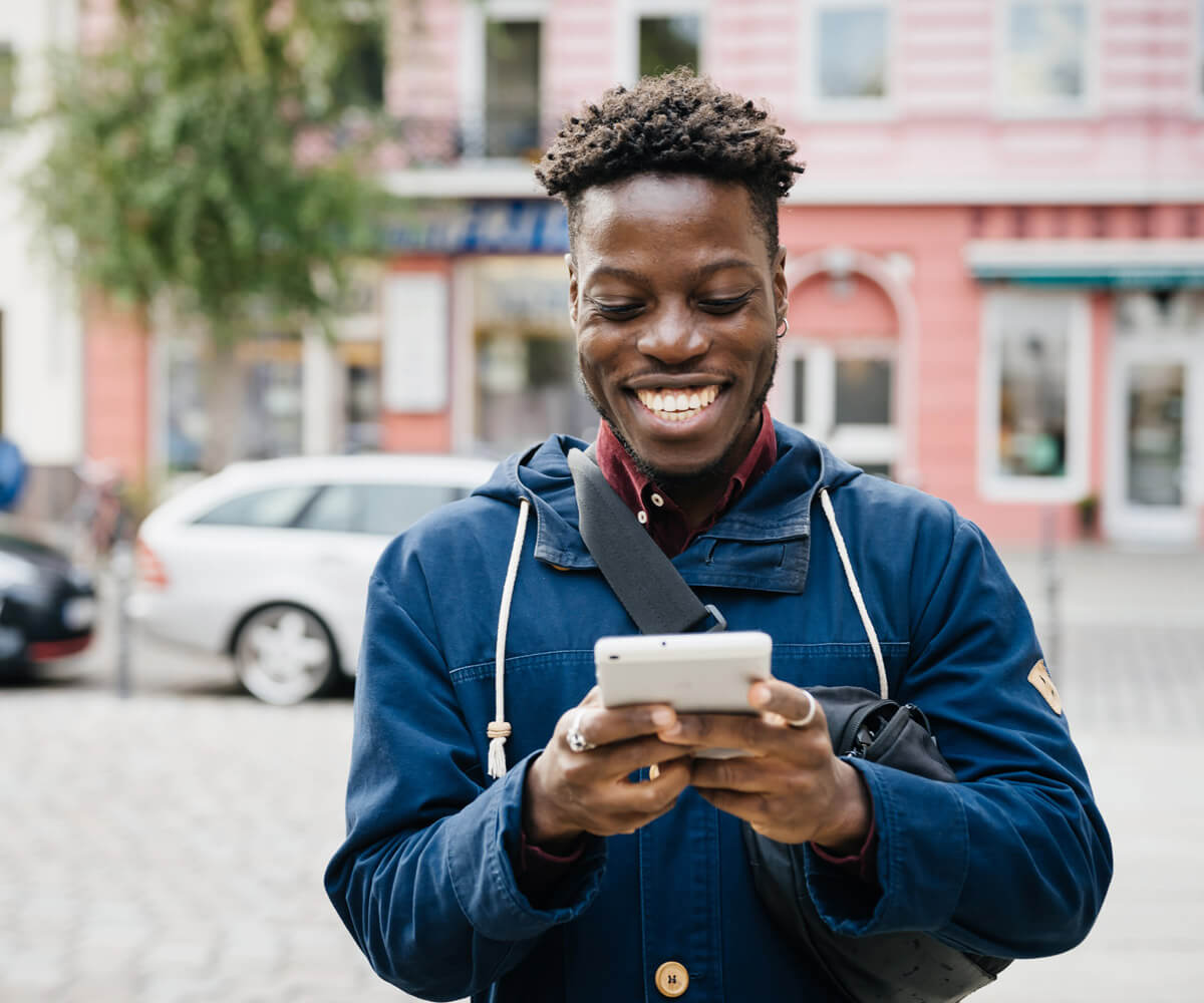 Happy person on mobile phone