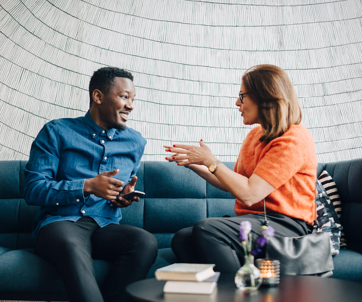 Man and woman having a casual business meeting