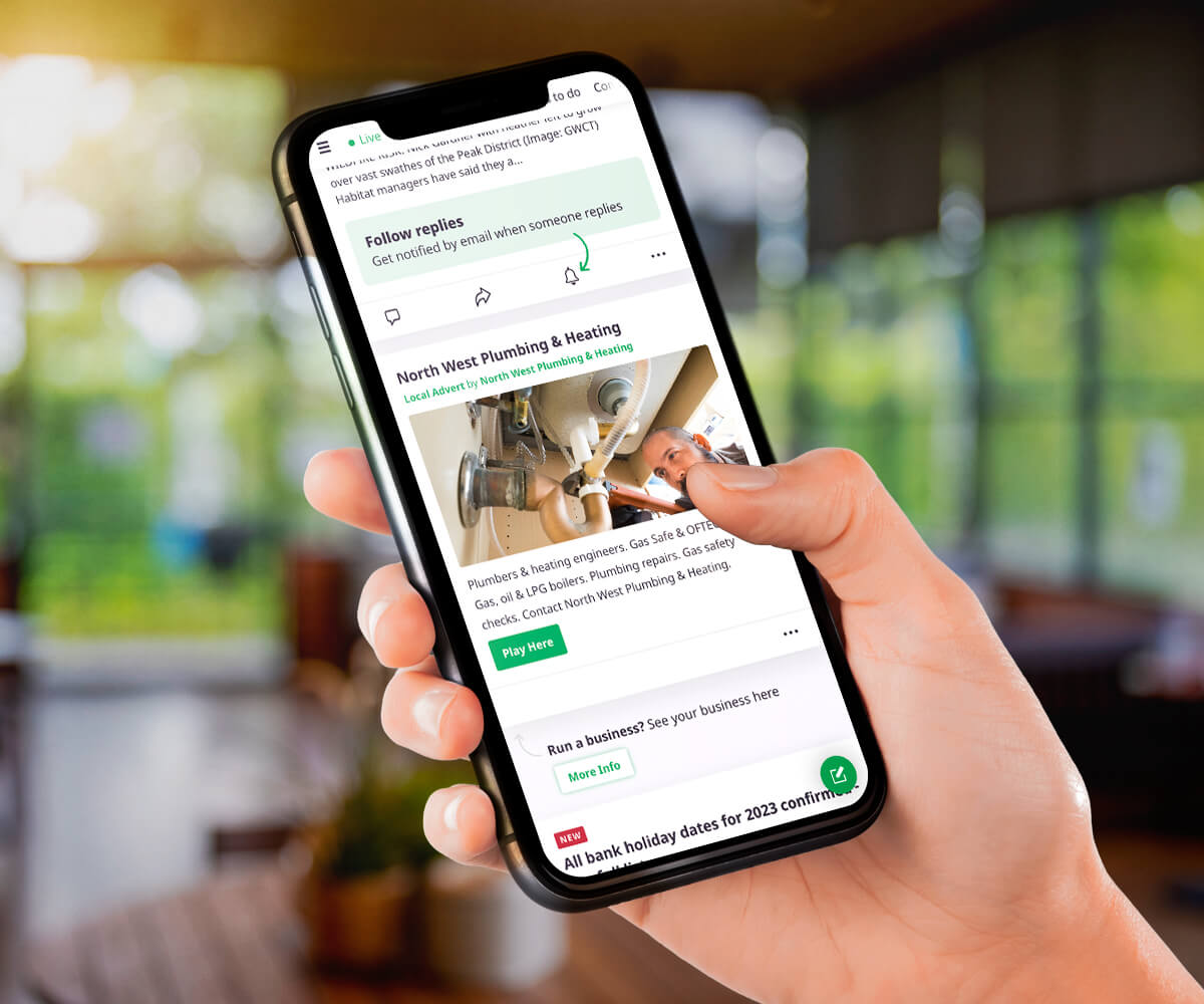 iPhone showing plumbing & heating business ad on InYourArea website