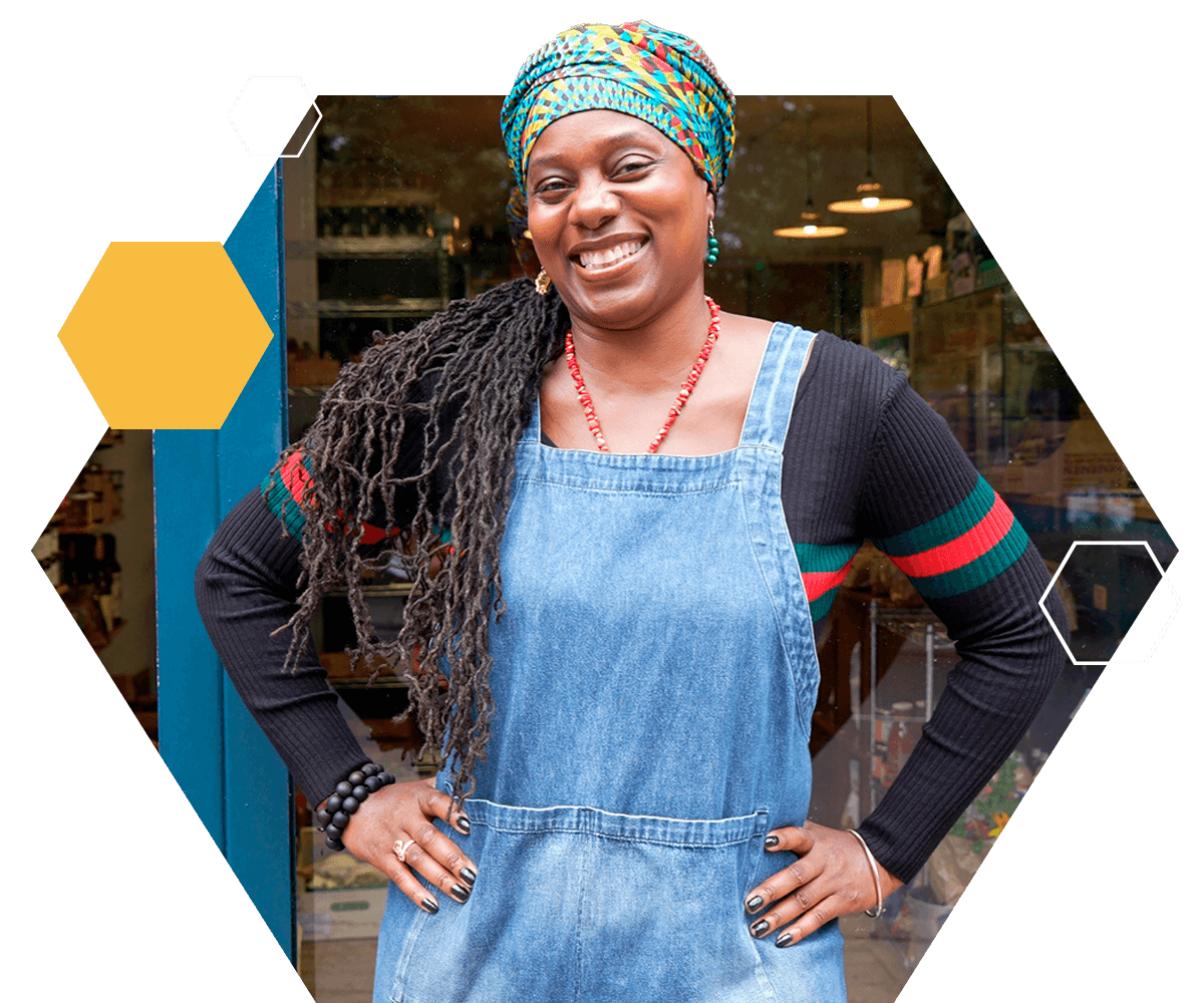 Small business owner woman standing outside shop